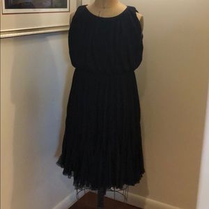 Black pleated sleeveless dress